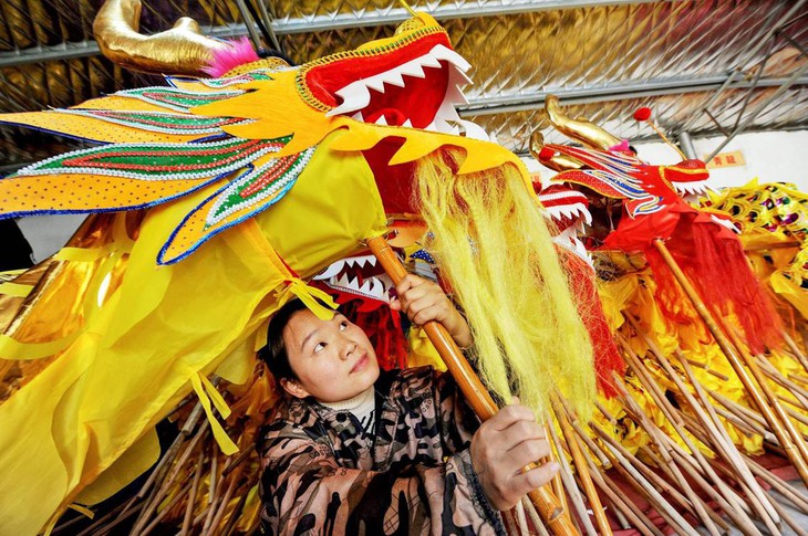 Châu Á thắm xuân, rộn ràng đón Tết Kỷ Hợi - Ảnh 12. Châu Á thắm xuân, rộn ràng đón Tết Kỷ Hợi - Ảnh 12.