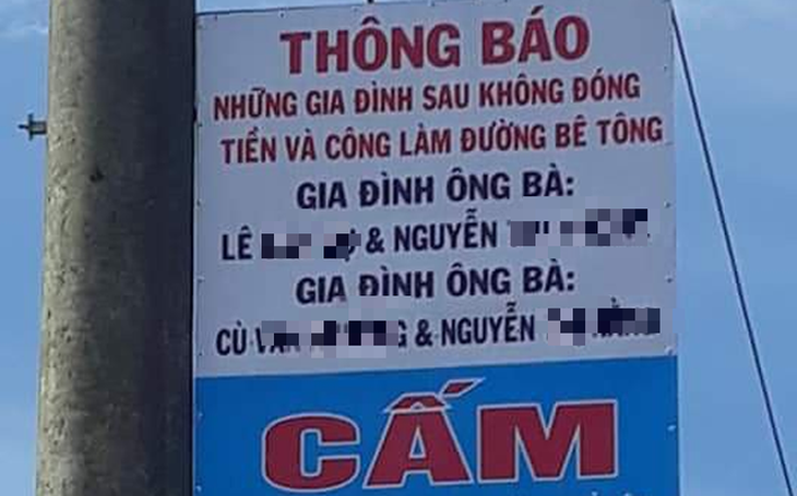 Không đóng tiền làm đường trong xóm, hai gia đình bị người dân bêu tên lên trụ điện