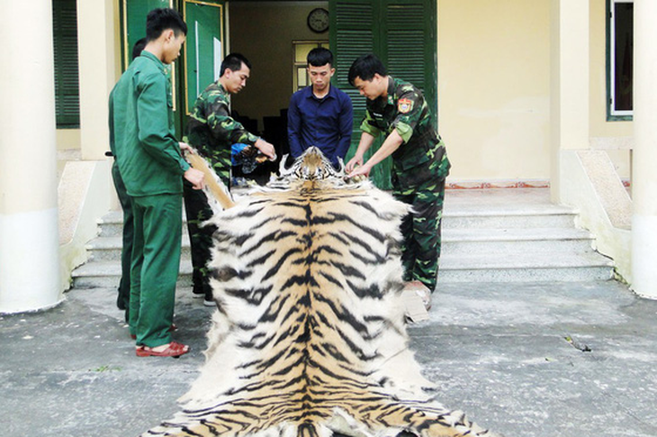 Bắt nam thanh niên mang da, xương hổ sang Trung Quốc bán - Ảnh 1.