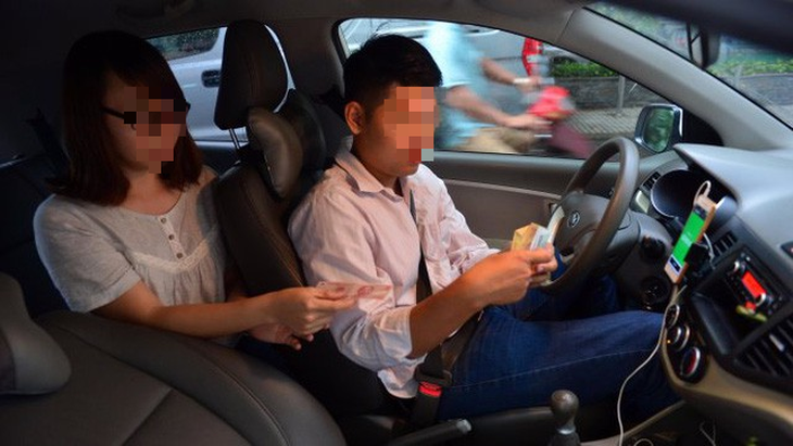 Hợp tác GrabTaxi, taxi truyền thống than vắng khách sử dụng - Ảnh 1.