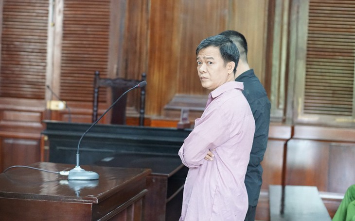 Mua USD giả, rạng sáng mang đi tiêu thụ ở Đà Nẵng: 2 người bị khởi tố - Ảnh 3.