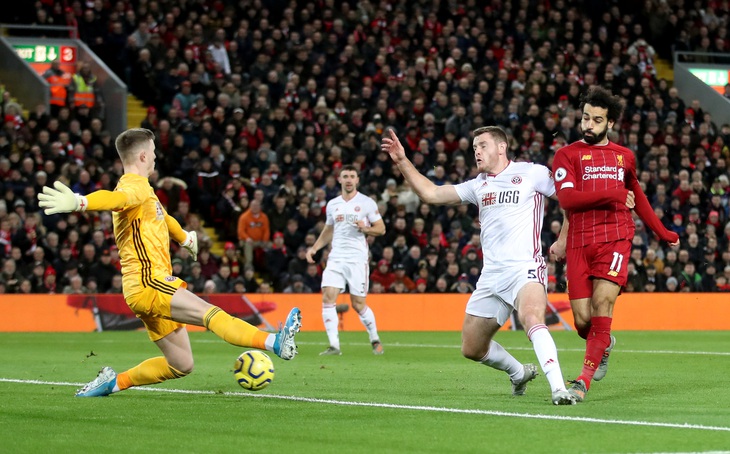 Thắng nhẹ nhàng Sheffield, Liverpool vững chắc ngôi đầu Premier League - Ảnh 1.