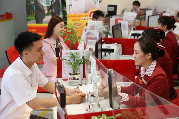 Ngân hàng tăng tốc trong cuộc đua chuyển đổi số - Ảnh 1. Ngân hàng tăng tốc trong cuộc đua chuyển đổi số - Ảnh 1.