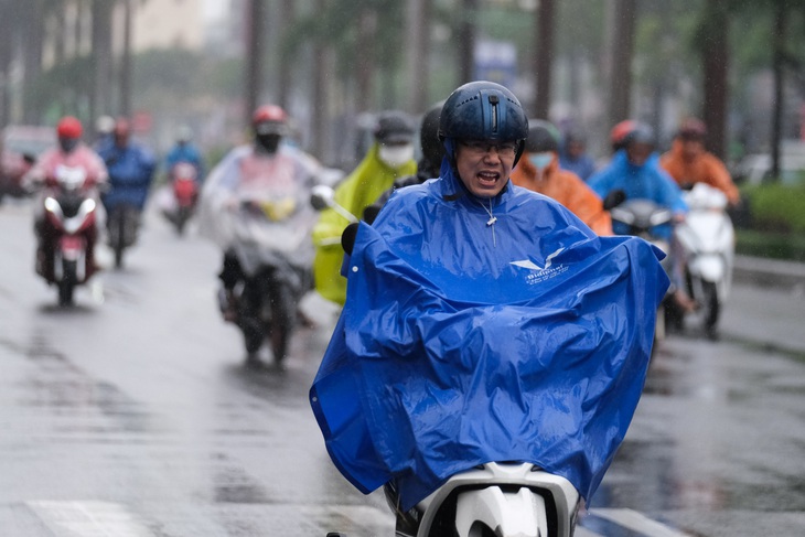 Không khí lạnh tràn về, người dân miền Bắc có thể đi làm khai xuân trong mưa rét - Ảnh 1.