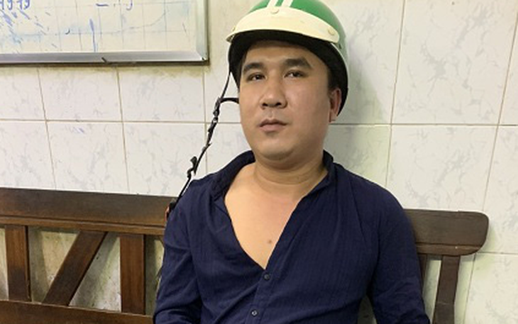 Tài xế xe ôm đang chở khách Nhật ở quận 1 
