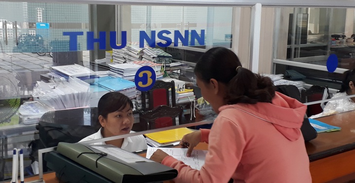 9 tháng, người làm công ăn lương đóng hơn 90 nghìn tỉ đồng thuế thu nhập cá nhân - Ảnh 1.