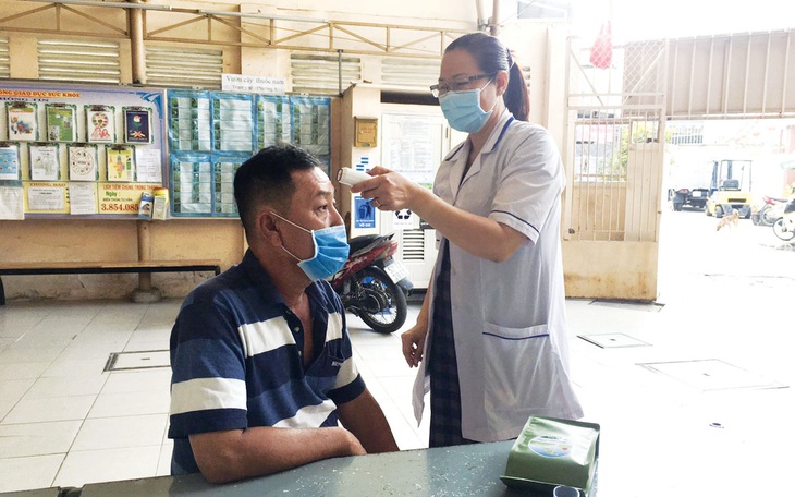 Những bước chân ở tuyến đầu chống dịch - Ảnh 1. Những bước chân ở tuyến đầu chống dịch - Ảnh 1.