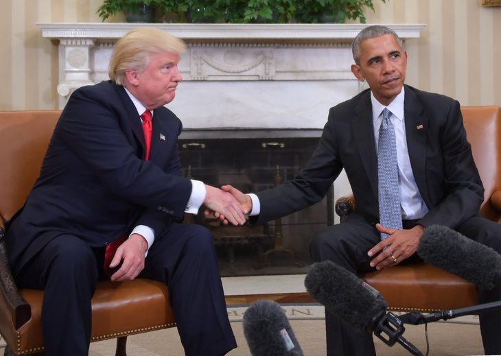 Vì sao ông Trump và ông Obama khẩu chiến? - Ảnh 1. Vì sao ông Trump và ông Obama khẩu chiến? - Ảnh 1.
