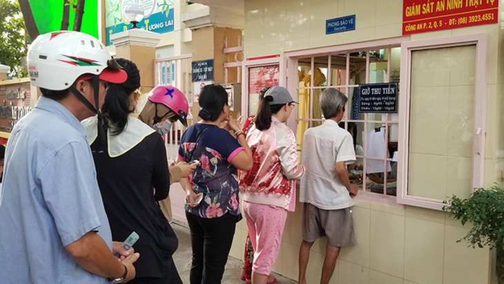 TP.HCM kiến nghị sớm cho cơ quan nhà nước trả phí dịch vụ ngân hàng - Ảnh 1.