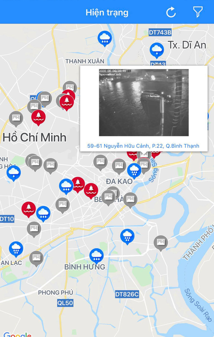 Hứng trận mưa lớn nhất từ đầu năm, nhiều đường trung tâm TP.HCM ngập nặng - Ảnh 2.