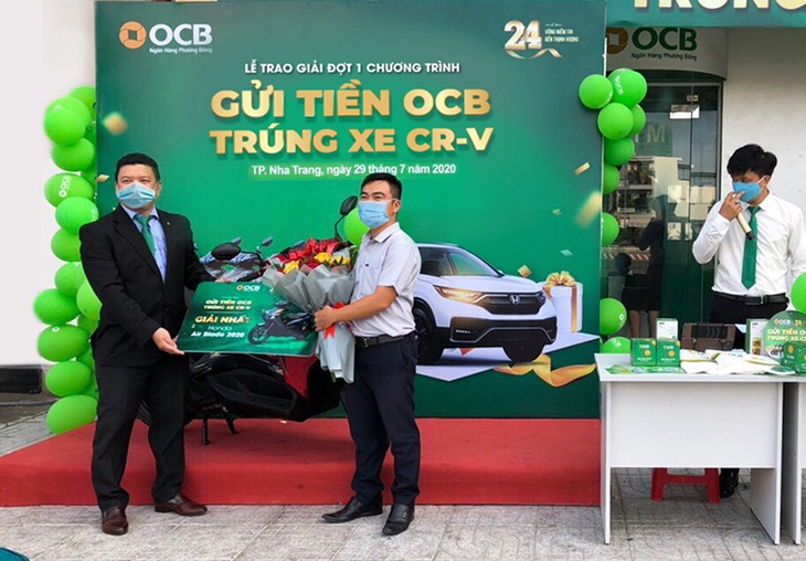 OCB trao giải đợt 1 chương trình Gửi tiền OCB - trúng ô tô CR-V - Ảnh 1. OCB trao giải đợt 1 chương trình Gửi tiền OCB - trúng ô tô CR-V - Ảnh 1.