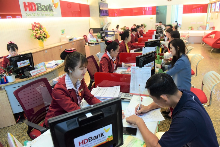 Ngân hàng đẩy mạnh cho vay sản xuất kinh doanh sau dịch - Ảnh 1. Ngân hàng đẩy mạnh cho vay sản xuất kinh doanh sau dịch - Ảnh 1.