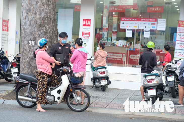 Tiệm điện thoại, máy tính kín lịch, kín đơn sửa chữa - Ảnh 4.