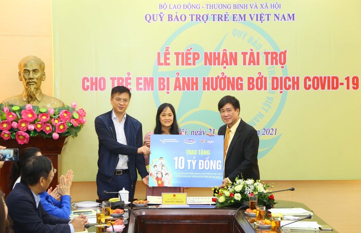 Hơn 11 tỉ đồng hỗ trợ gần 2.500 trẻ mồ côi do dịch COVID-19 - Ảnh 1. Hơn 11 tỉ đồng hỗ trợ gần 2.500 trẻ mồ côi do dịch COVID-19 - Ảnh 1.