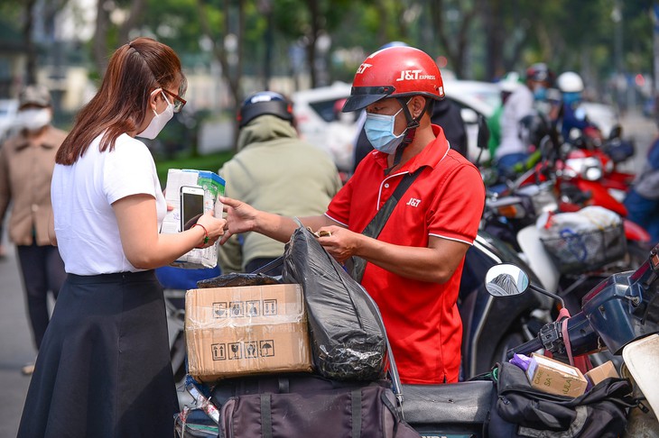 Thương mại điện tử khép lại năm 2021 bằng mùa khuyến mãi thắng lớn - Ảnh 1.