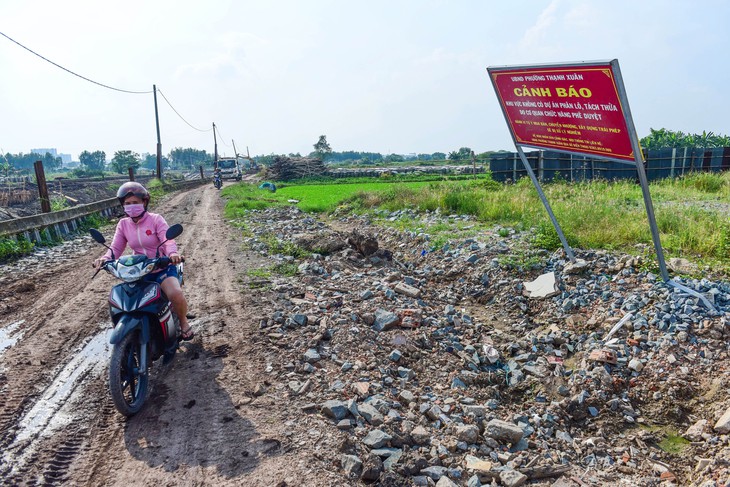 Rủi ro bủa vây người mua bất động sản - Ảnh 1.