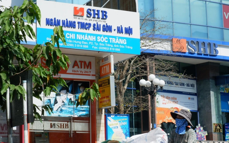 Anh em cựu phó giám đốc ngân hàng bị cáo buộc lừa đảo 2 căn nhà tại Đà Nẵng - Ảnh 2.