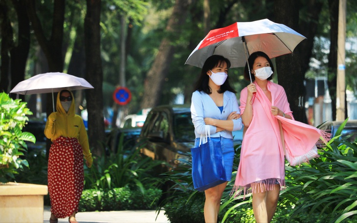 Người dân TP.HCM có thể chịu cái nóng tới 39 độ C - Ảnh 1. Người dân TP.HCM có thể chịu cái nóng tới 39 độ C - Ảnh 1.