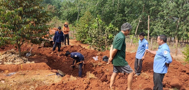 Bình Phước quy tập được 10 bộ hài cốt liệt sĩ nơi biên giới - Ảnh 1.