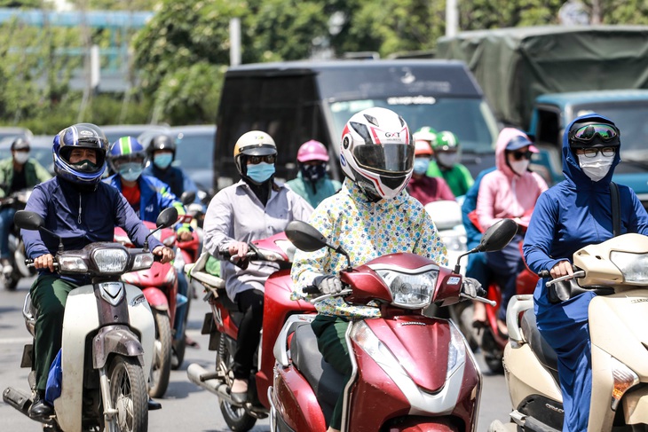 Tia cực tím tại Nam Bộ ở mức nguy hiểm, người dân nên hạn chế ra ngoài lúc trưa - Ảnh 1.