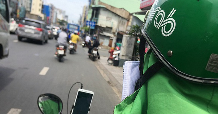 Một tài xế GrabBike tại TP.HCM dương tính lần 1 với COVID-19 - Ảnh 1.