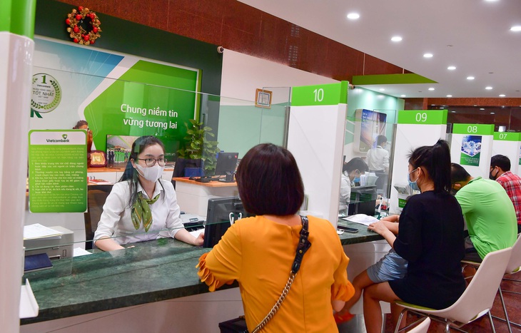 Vietcombank tiếp tục chia sẻ với khách hàng - Ảnh 1.