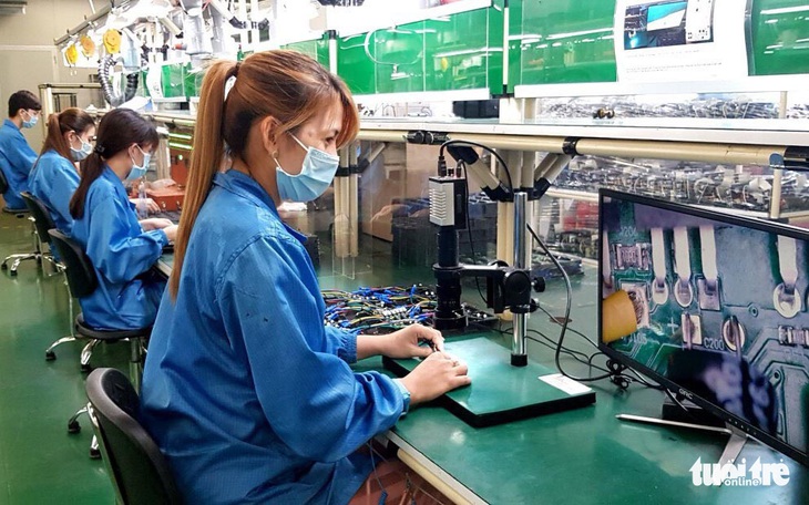 Gửi con để vợ chồng cùng vô xưởng - Ảnh 1. Gửi con để vợ chồng cùng vô xưởng - Ảnh 1.