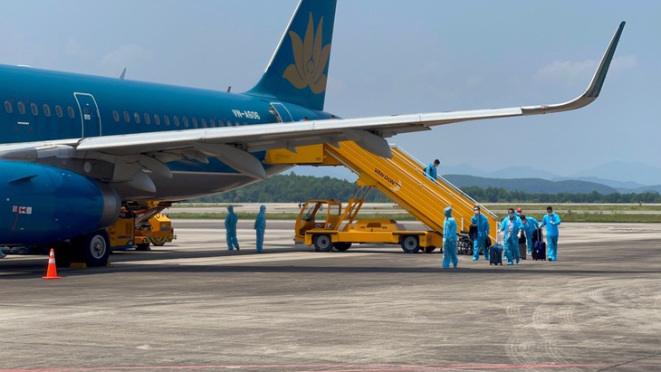 350 khách từ Mỹ về Việt Nam được cách ly thí điểm 7 ngày - Ảnh 1. 350 khách từ Mỹ về Việt Nam được cách ly thí điểm 7 ngày - Ảnh 1.