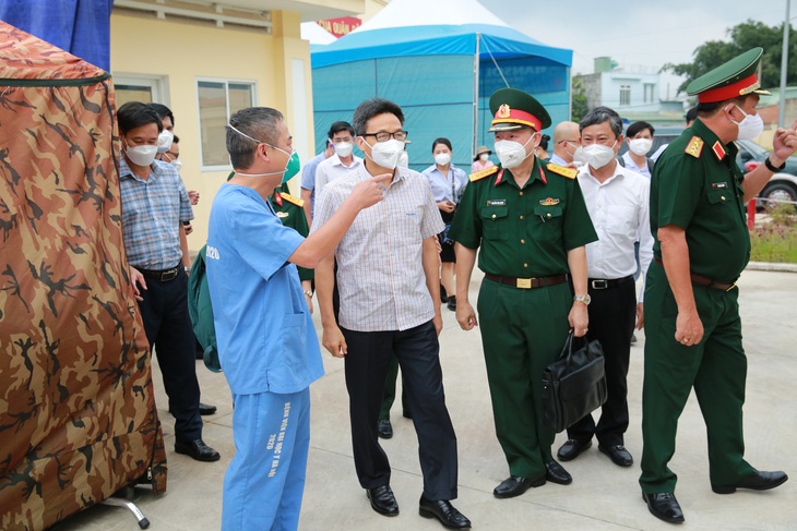 Phó thủ tướng Vũ Đức Đam: Tất cả loại hình sản xuất nếu an toàn thì nên cho mở - Ảnh 1.