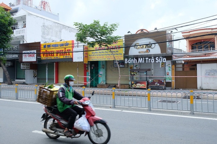 Dù trong viễn cảnh nào, nền kinh tế cần được mở cửa trở lại - Ảnh 2.