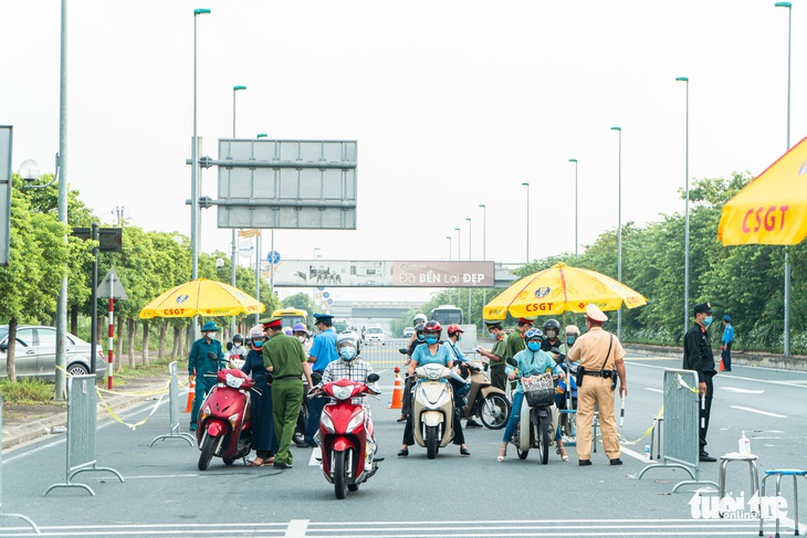 Người dân muốn ra vào Hà Nội từ 21-9 cần giấy tờ, thủ tục gì? - Ảnh 1.