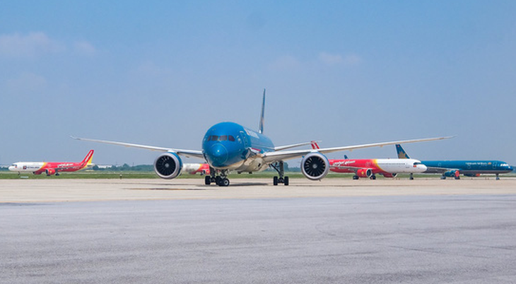 HỎI - ĐÁP về dịch COVID-19: Cục yêu cầu dừng mở bán vé, tại sao Vietnam Airlines vẫn bán? - Ảnh 1.