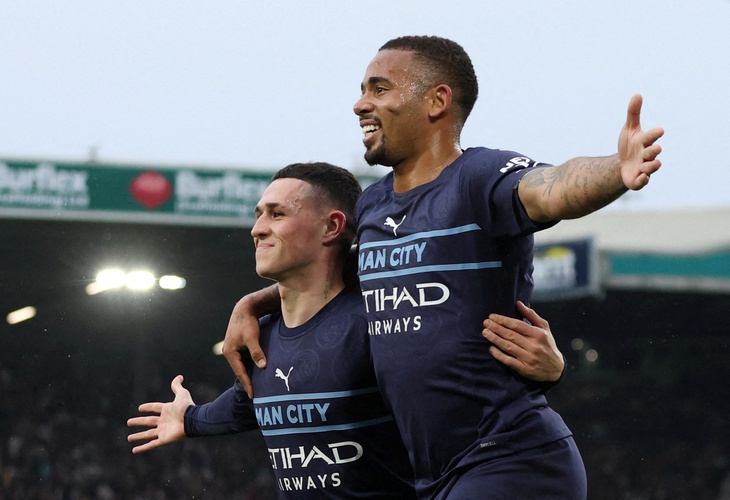 Man City tiếp tục dẫn đầu Premier League, Norwich rớt hạng - Ảnh 1.