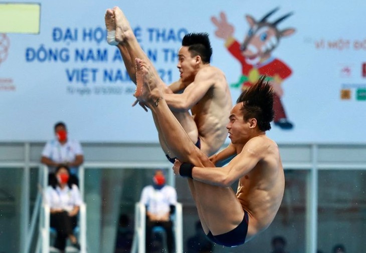 Nhảy cầu mang về cho Malaysia 2 huy chương vàng đầu tiên ở SEA Games 31 - Ảnh 4.