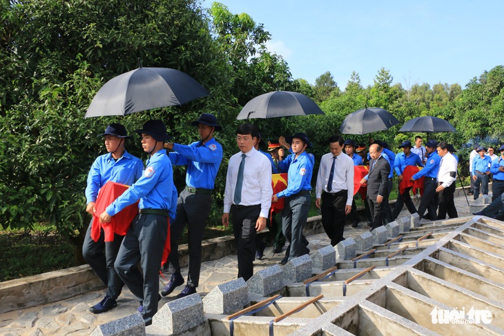 Truy điệu, cải táng 80 hài cốt liệt sĩ quân tình nguyện và chuyên gia Việt Nam - Ảnh 1.