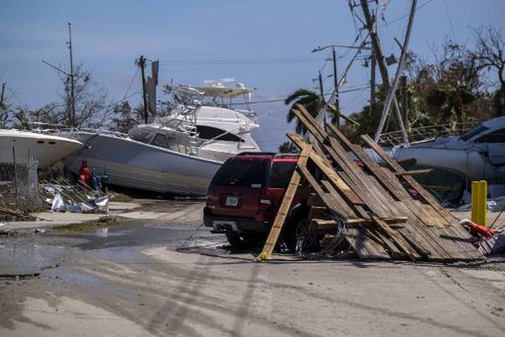 Bang Florida ngổn ngang sau bão Ian - Ảnh 8.