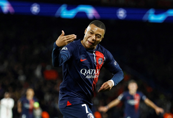 Niềm vui của Mbappe sau khi ghi bàn vào lưới AC Milan - Ảnh: REUTERS