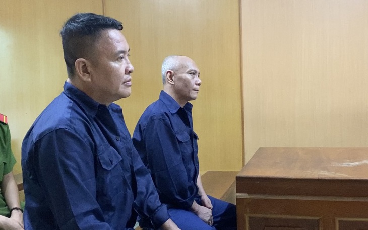 Mua USD giả, rạng sáng mang đi tiêu thụ ở Đà Nẵng: 2 người bị khởi tố - Ảnh 2.