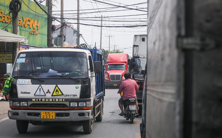 Vốn mở rộng đường Nguyễn Duy Trinh tăng do phí giải phóng mặt bằng - Ảnh 3.