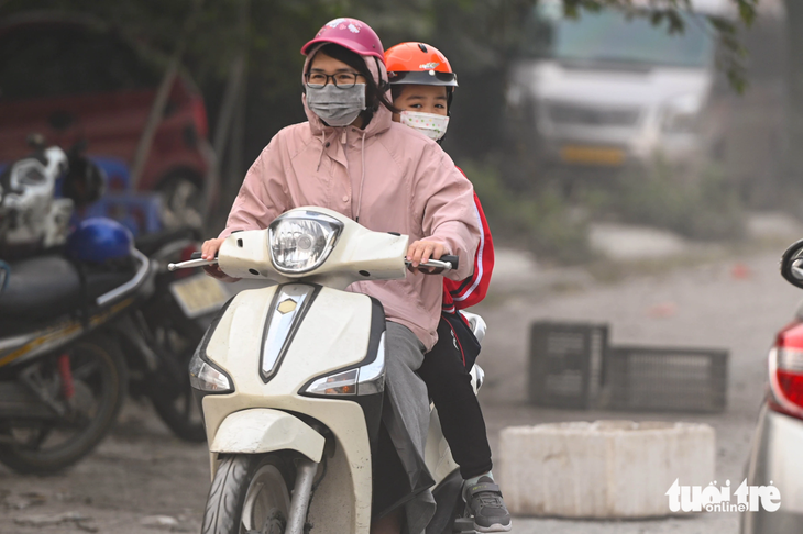 Bầu trời Hà Nội mù đặc, ô nhiễm không khí tệ thứ 2 thế giới- Ảnh 6.