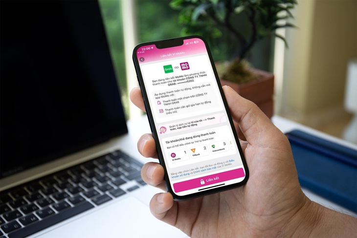 Người dùng chỉ cần thực hiện liên kết MoMo một lần duy nhất để MoMo trở thành phương thức thanh toán trên Grab - Ảnh: MoMo