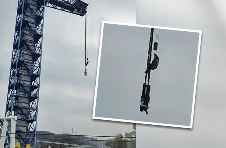 Cặp đôi Trung Quốc nhảy bungee rồi ôm nhau lơ lửng giữa không trung - Ảnh 1.