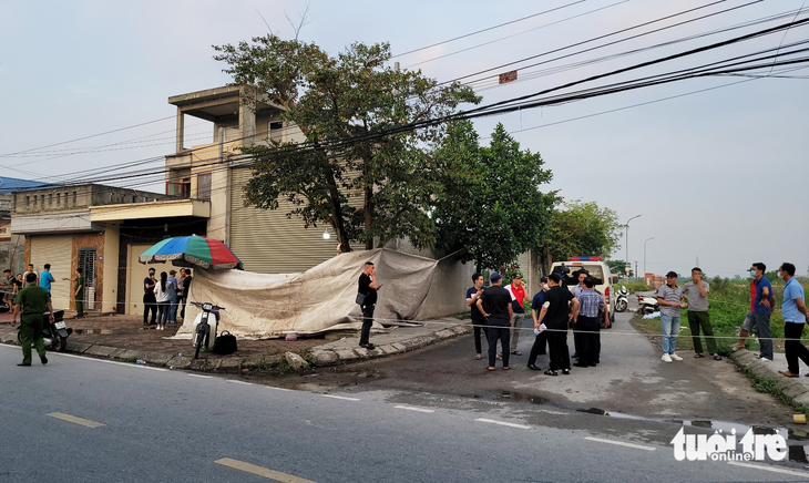 Thi thể trong bao tải đặt trên vỉa hè là người phụ nữ có 2 con nhỏ - Ảnh 3.