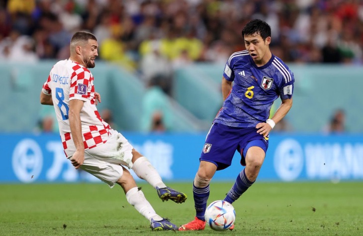 Endo (phải) từng tỏa sáng ở World Cup 2022 - Ảnh: REUTERS