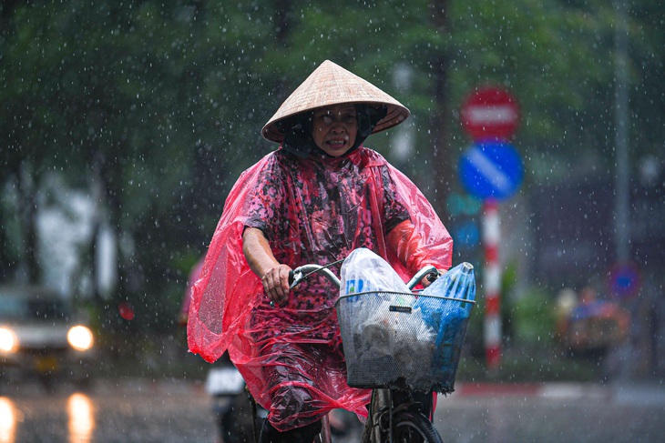 Bắc Bộ và Bắc Trung Bộ mưa to kéo dài ba ngày - Ảnh: NAM TRẦN