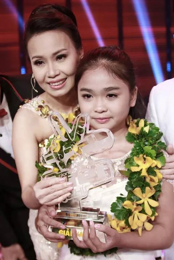 Cẩm Ly là huấn luyện viên của Thiện Nhân tại &quot;The Voice Kids 2014&quot;, năm đó Thiên Nhân xuất sắc giành giải quán quân - Ảnh: BTC