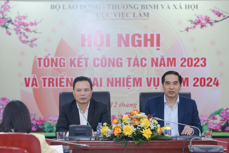 Thứ trưởng Bộ Lao động - Thương binh và Xã hội Lê Văn Thanh (bên trái) đồng chủ trì với Cục trưởng Cục Việc làm Vũ Trọng Bình - Ảnh: GIA ĐOÀN