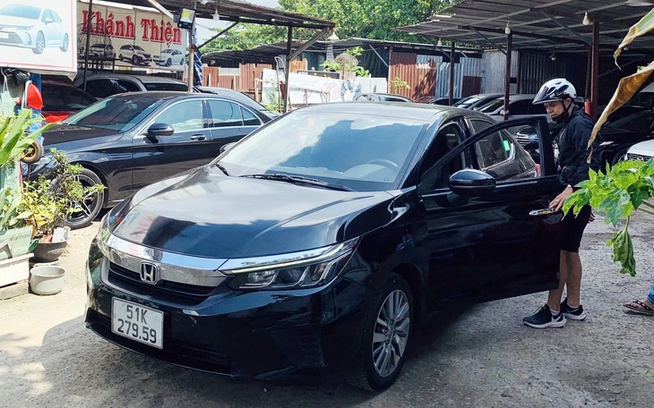 Can thiệp để điều chỉnh tiền cước trên đồng hồ taxi, tài xế bị phạt thế nào? - Ảnh 2.