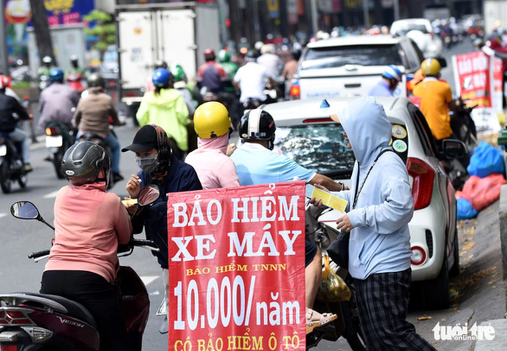 Bắt buộc mua bảo hiểm xe máy, phải sòng phẳng bồi thường tiền - Ảnh 1.