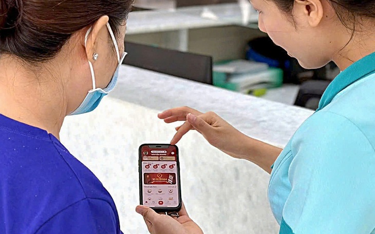 Sổ sức khỏe điện tử trên VNeID chính thức thay thế sổ giấy trong thủ tục hành chính - Ảnh 2.